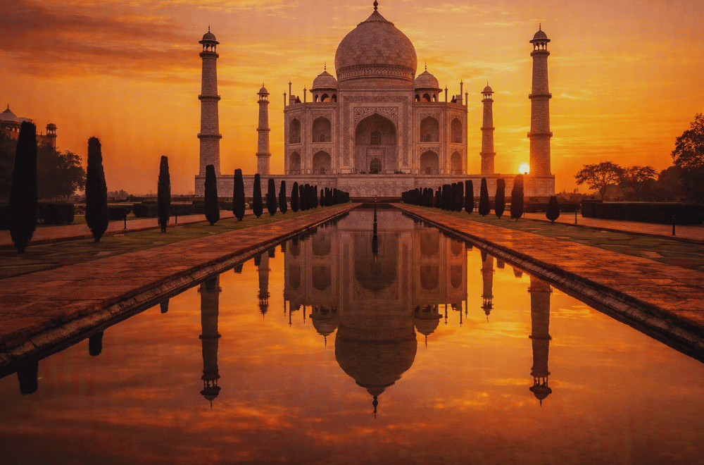 "Taj Mahal India sunrise tourist attraction crowd" 